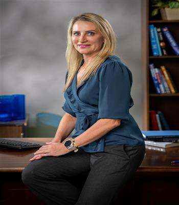Dr. Cortney Richa Hebert, Principal